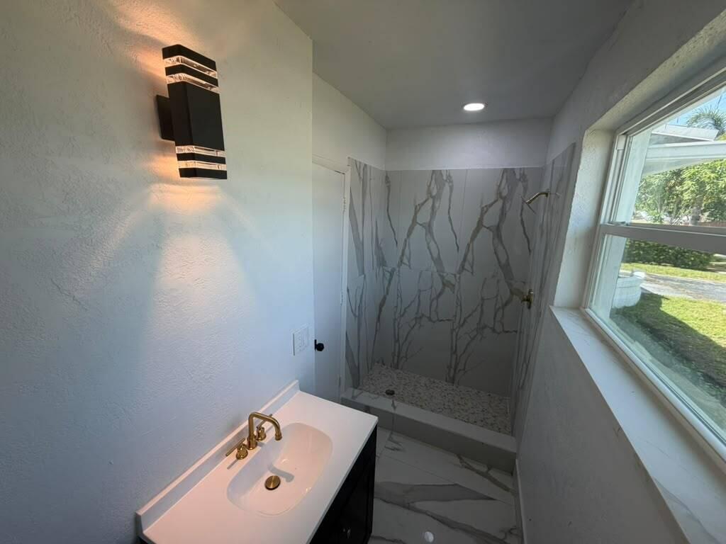 Photo of 3911 NW 32ND Avenue, Lauderdale Lakes, FL 33309 (MLS # B26069331)