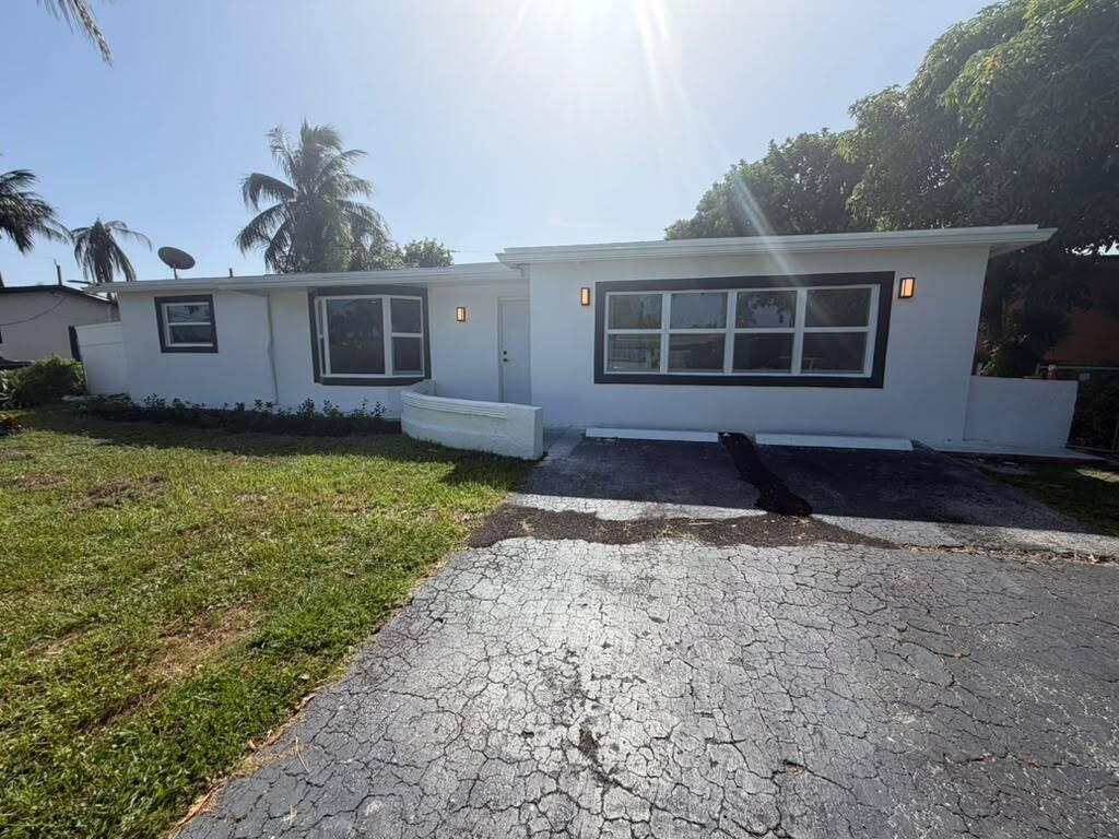 Photo of 3911 NW 32ND Avenue, Lauderdale Lakes, FL 33309 (MLS # B26069331)