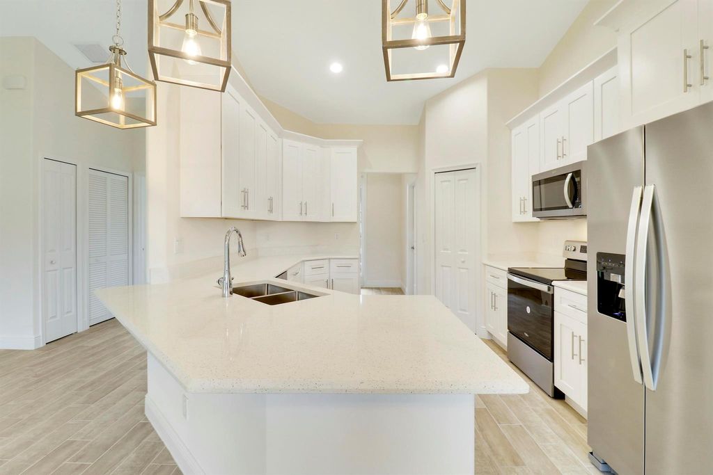 Photo of 5947 NW Center Street, Port Saint Lucie, FL 34986 (MLS # R11094260)