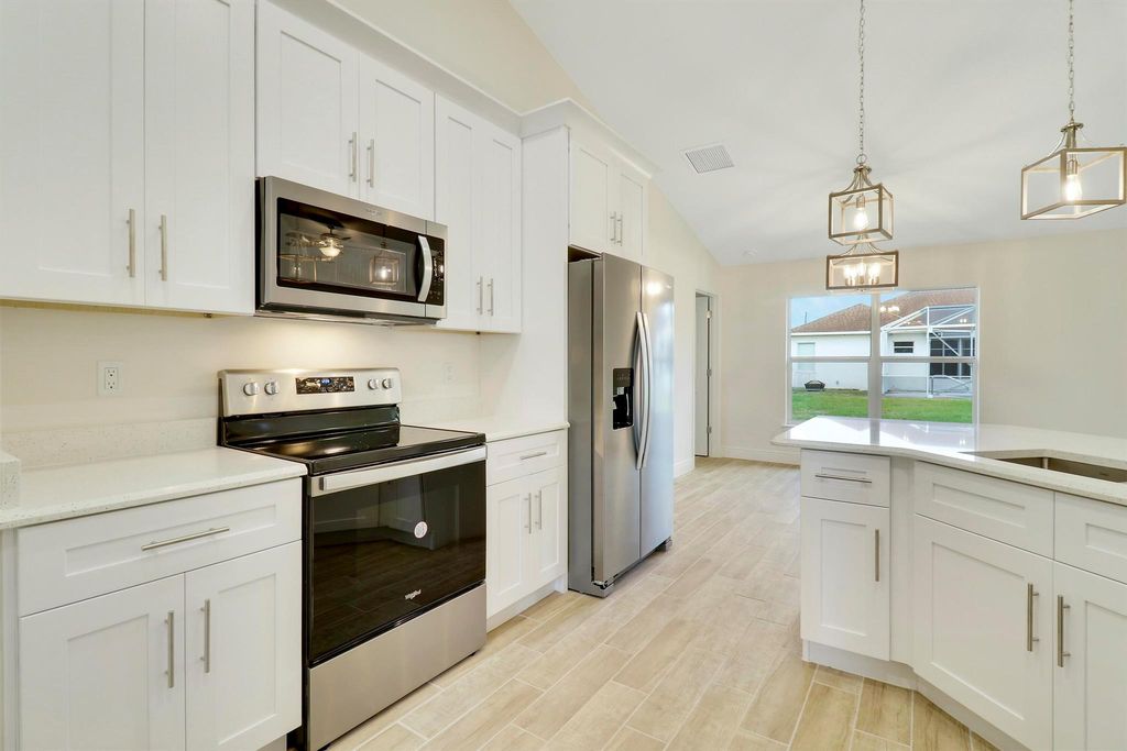 Photo of 5947 NW Center Street, Port Saint Lucie, FL 34986 (MLS # R11094260)