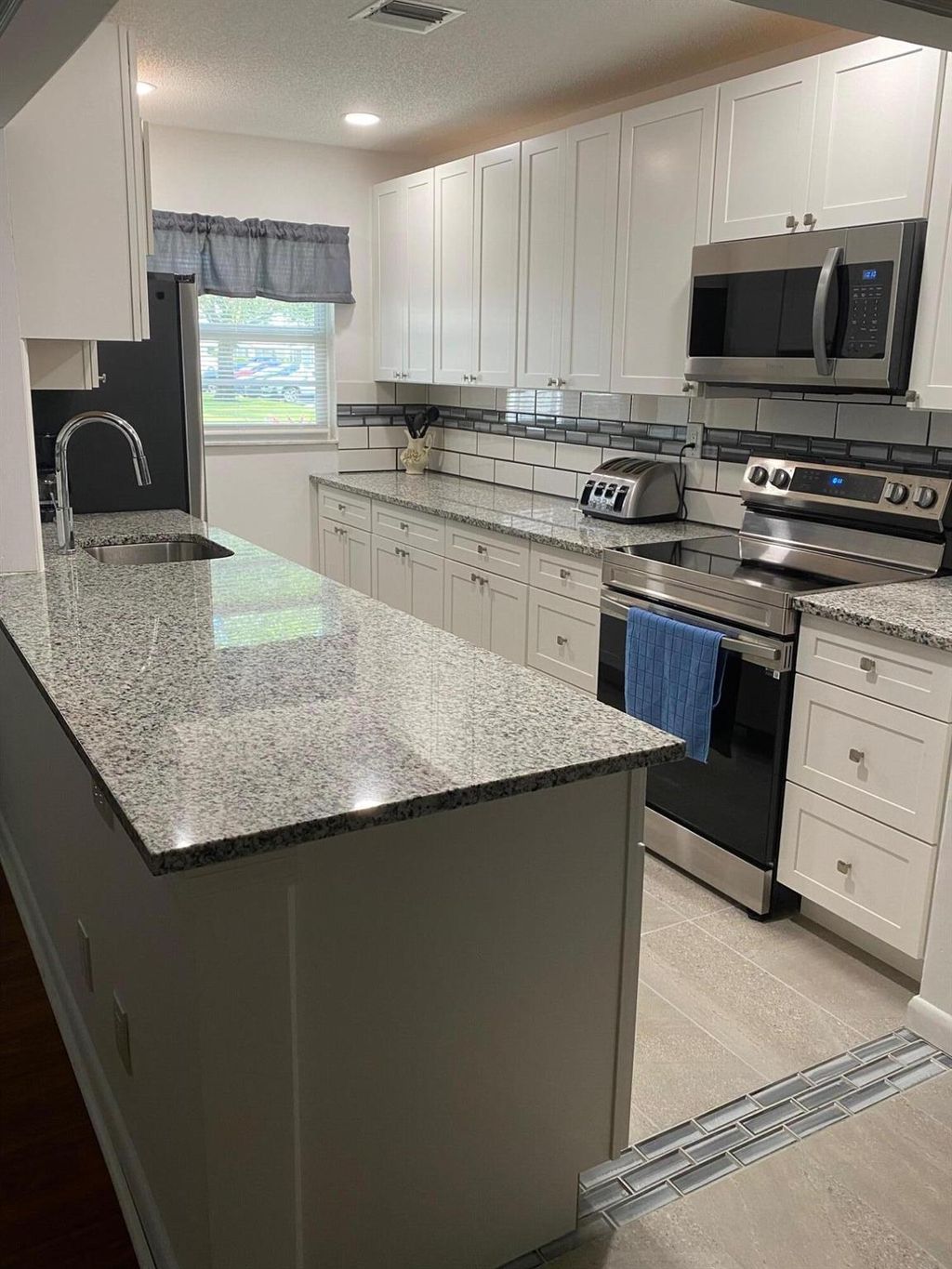 Photo of 14572 Canalview Drive #C, Delray Beach, FL 33484 (MLS # R11102028)