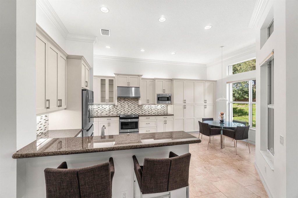 Photo of 9734 Dovetree Isle Drive, Boynton Beach, FL 33473 (MLS # R11132856)