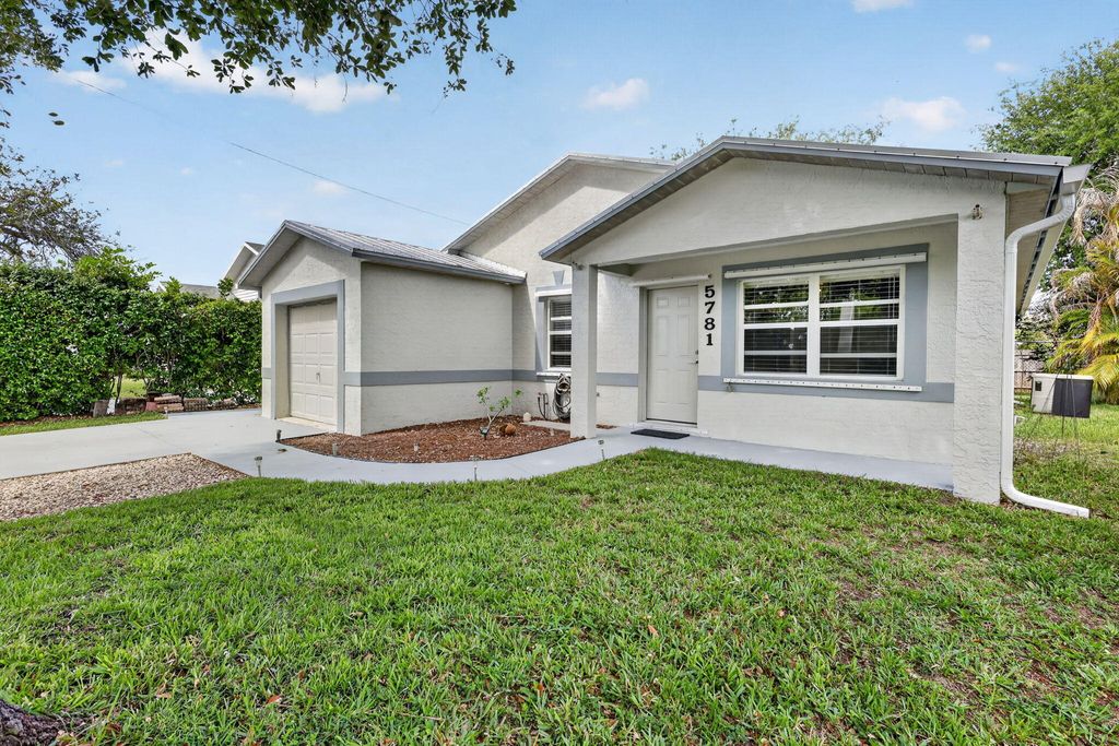 Photo of 5781 SE Pine Drive, Stuart, FL 34997 (MLS # B26013073)