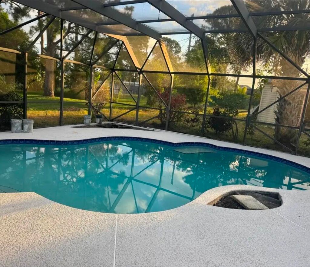 Photo of 1813 SE Balletos Street, Port Saint Lucie, FL 34952 (MLS # R11159385)