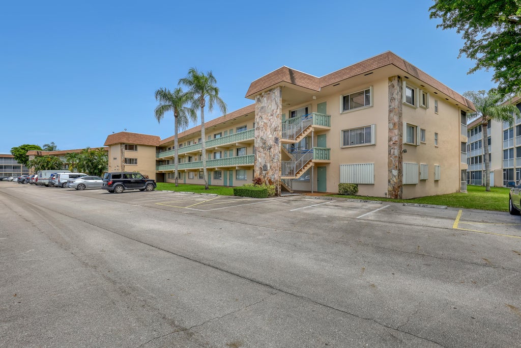 Photo of 400 VILLAGE GREEN Circle W #117, Palm Springs, FL 33461 (MLS # B26065994)