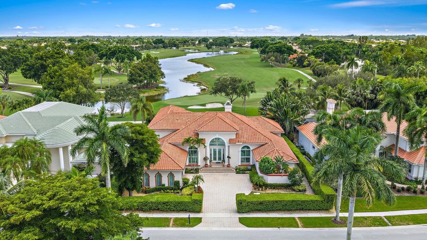 IMMEDIATE PREMIER GOLF MEMBERSHIP AVAILABLE! Luxurious upgrades and incredible privacy define this renovated 6BR/7.5BA + Den + Loft custom Mustapick-built estate. Perfectly situated on the 17th Green of the Nicklaus-designed Legend Course and ideally located within the award-winning Club at Ibis, this Mediterranean masterpiece boasts a NEW ROOF (2021) and full IMPACT GLASS (2023).Designed with entertaining in mind, the home features rich Mediterranean influences. Ornate trompe l'oeil niches frame a carved stone gas fireplace, while a mahogany-style balustrade leads to a formal sunken living room. The recessed wet bar, complete with a hammered-copper sink, is conveniently nearby.