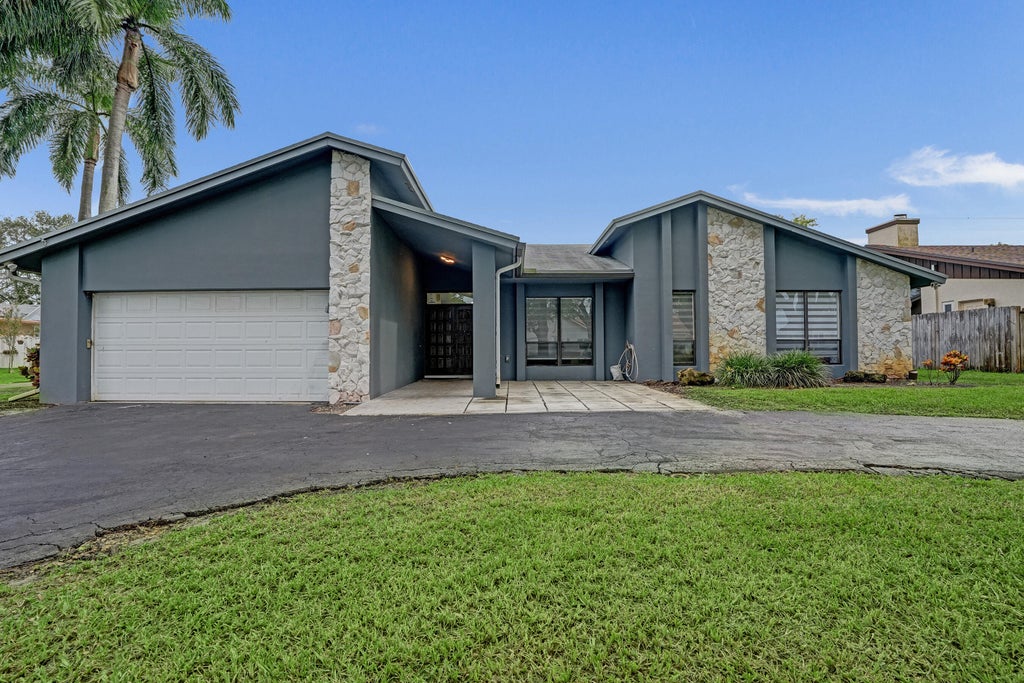 Photo of 11700 S ISLAND Road, Cooper City, FL 33026 (MLS # B26081698)