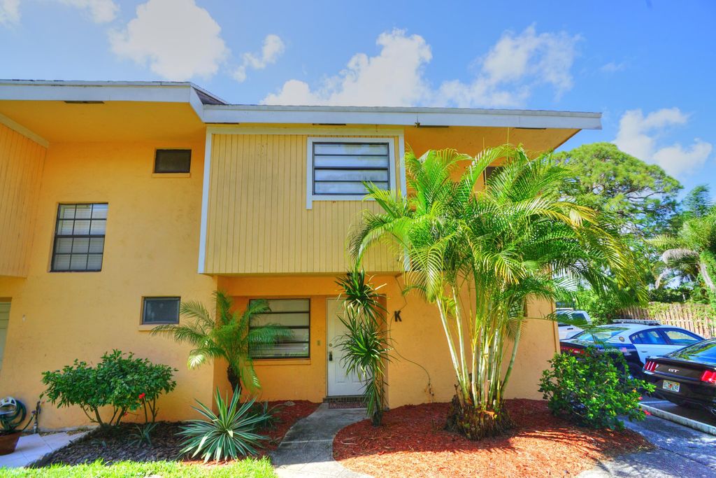 Photo of 4330 Lilac Street #K, Palm Beach Gardens, FL 33410 (MLS # R11019129)