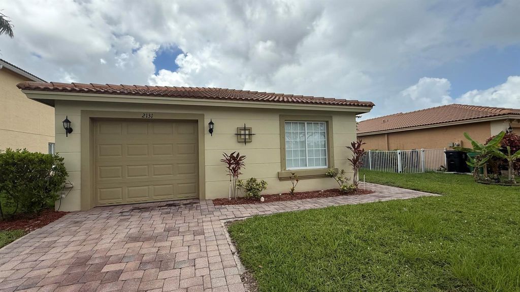 Photo of 2131 SW Newport Isles Blvd, Port Saint Lucie, FL 34953 (MLS # R11102352)