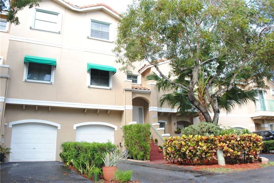 PRICED TO SELL!! BEAUTIFULLY REMODELED TRILEVEL TOWNHOME! This Beautiful 3 bedroom, 3 bathroom home comes with a newly remodeled kitchen with wood cabinets, high end stainless steel appliances & granite countertops. Updated Bathrooms. Large master bedroom & ensuite bathroom. Neutral tile, carpet in bedrooms. Full Accordion shutters throughout. One car garage. Guest parking close by.  Close to shopping, highways and schools. Steps from the Sawgrass mall, Publix, fine dining and I-75. Definitely a must see!