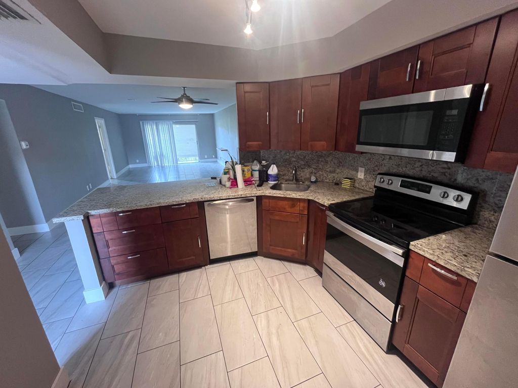 Photo of 6301 N Falls Circle Drive #111, Lauderhill, FL 33319 (MLS # B26008658)