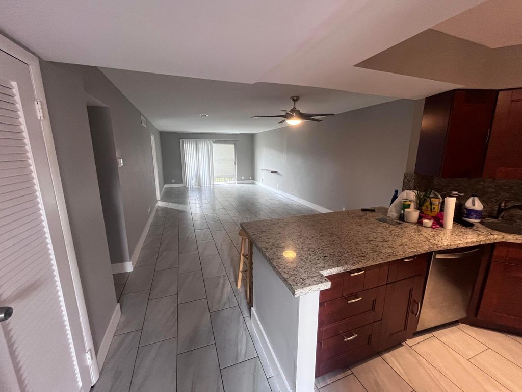 Photo of 6301 N Falls Circle Drive #111, Lauderhill, FL 33319 (MLS # B26008658)