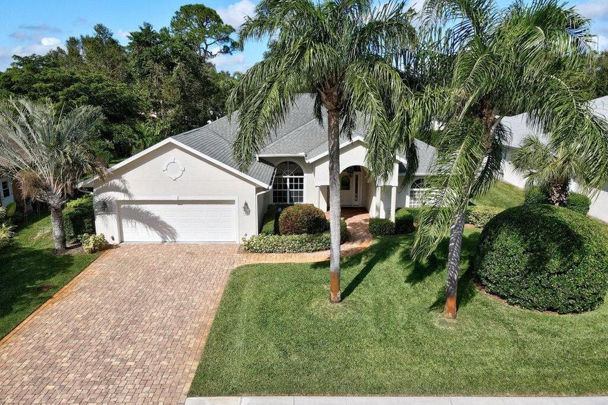 The Laurels – One of Vero's exclusive mature communities. This beautifully landscaped & fenced home boasts 4 Bed/3Bath, 2,758 sq ft, CBS, 32-acre premier lot. A grand entrance to formal LR & DR w/plantation shutters. Kitchen w/breakfast nook with a view of lanai.  Master Bedroom w/2 walk-in closets, 4th Bedroom w/priv. bath & cabana door to backyard. Oversized 2-car gar, 20KW GENERAC generator. Roof 2014, WH 2019, 2-zone AC system; main AC 2018.  Oversized laundry room with sink, add'l refrigerator/freezer, W/D.  It's all here for you!