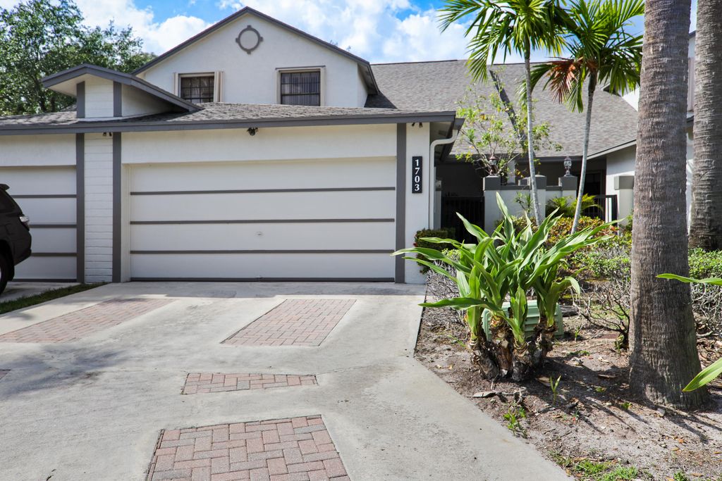 Photo of 1703 Landings Boulevard, Greenacres, FL 33413 (MLS # R10970695)