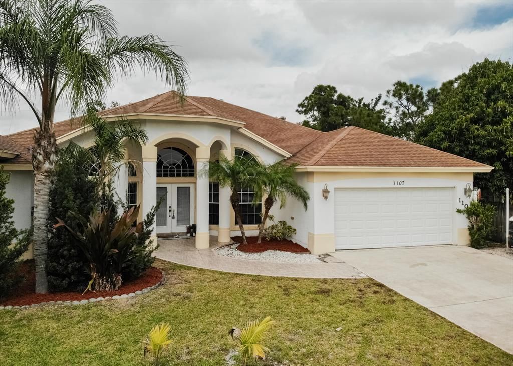 Photo of 1107 SW Estaugh Avenue, Port Saint Lucie, FL 34953 (MLS # R10704018)