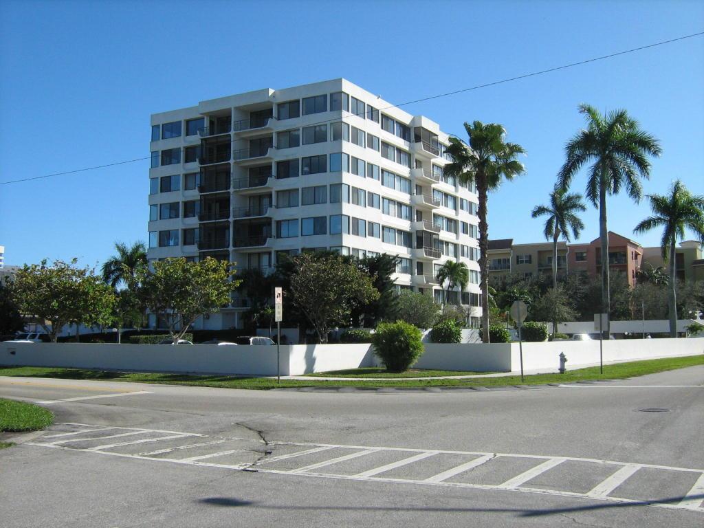 Updated first floor, CORNER unit gets tons of natural light. Private garden/patio area. Updated kitchen with L-shaped island. Tile throughout. Secure building access. Prime location just minutes from PBI, Kravis, Downtown, Outlets and I-95.