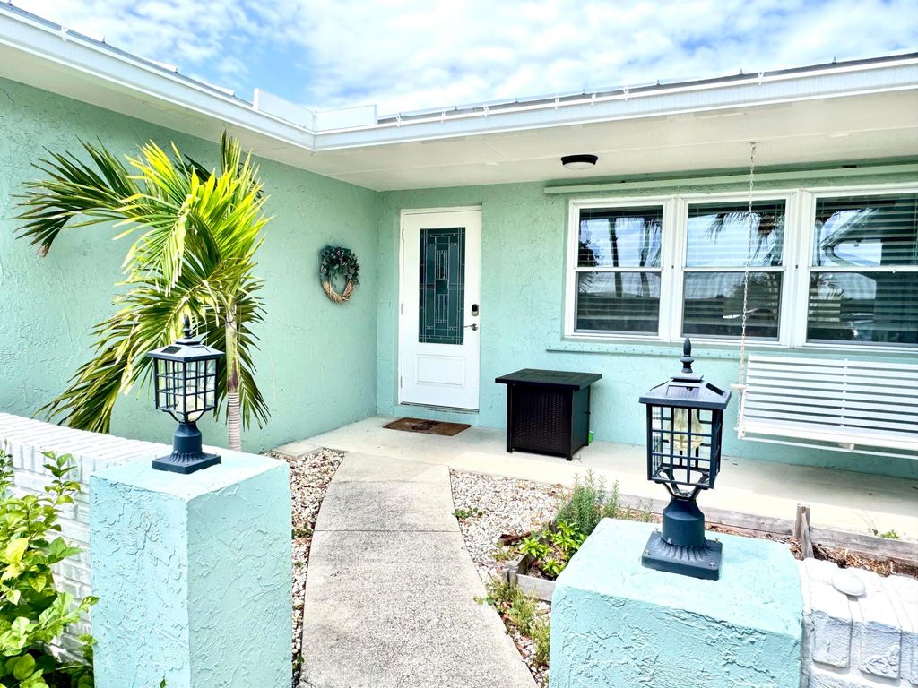 Photo of 1703 NE 25th Terrace, Jensen Beach, FL 34957 (MLS # B26008095)