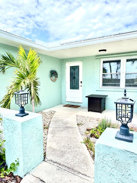 Photo of 1703 NE 25th Terrace, Jensen Beach, FL 34957 (MLS # B26008095)