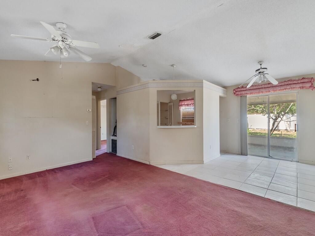 Photo of 188 SW Milburn Circle, Port Saint Lucie, FL 34953 (MLS # B26018402)