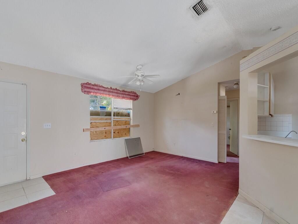 Photo of 188 SW Milburn Circle, Port Saint Lucie, FL 34953 (MLS # B26018402)