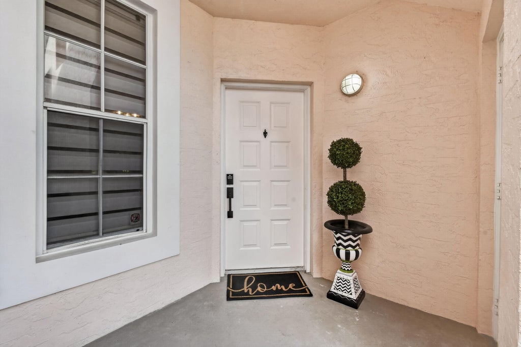 Photo of 701 MUIRFIELD Court #701E, Jupiter, FL 33458 (MLS # B26079020)