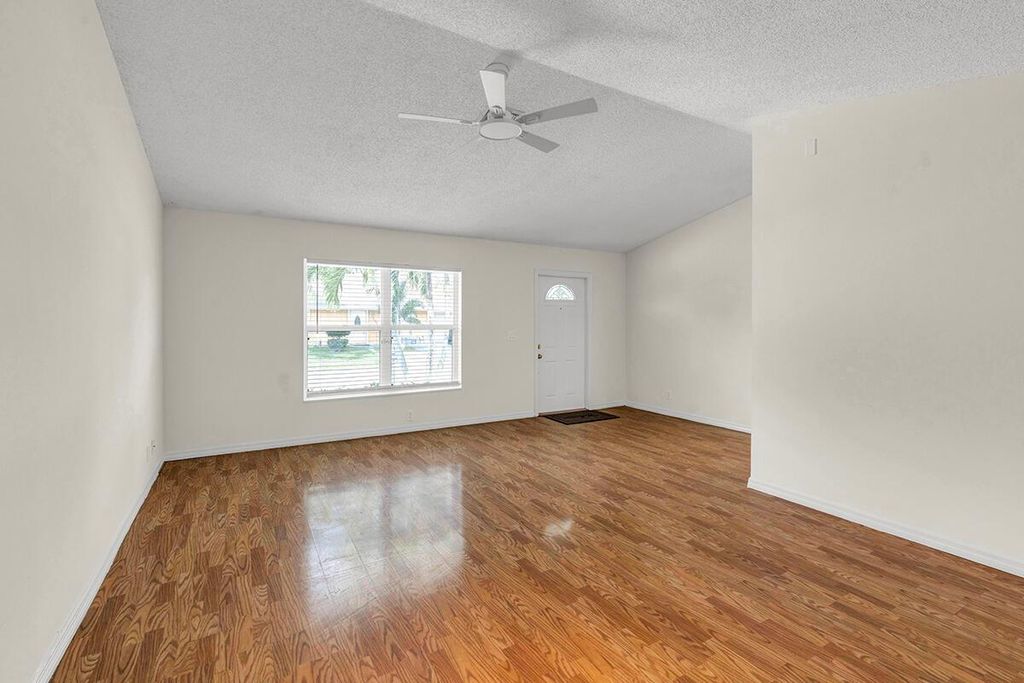 Photo of 5604 Priscilla Lane NE, Lake Worth, FL 33463 (MLS # R11084638)