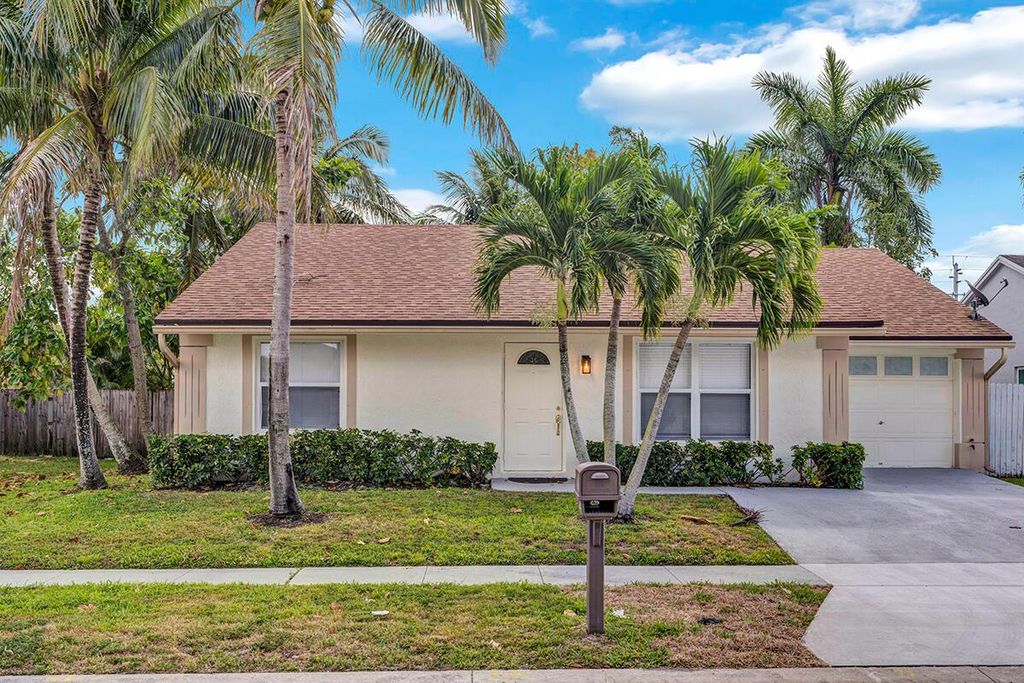 Photo of 5604 Priscilla Lane NE, Lake Worth, FL 33463 (MLS # R11084638)