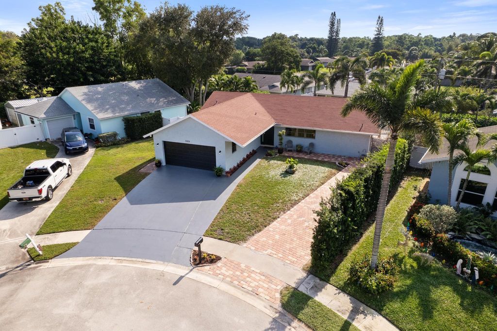 Photo of 3904 NW Tracewood Lane, Boynton Beach, FL 33436 (MLS # R11149070)