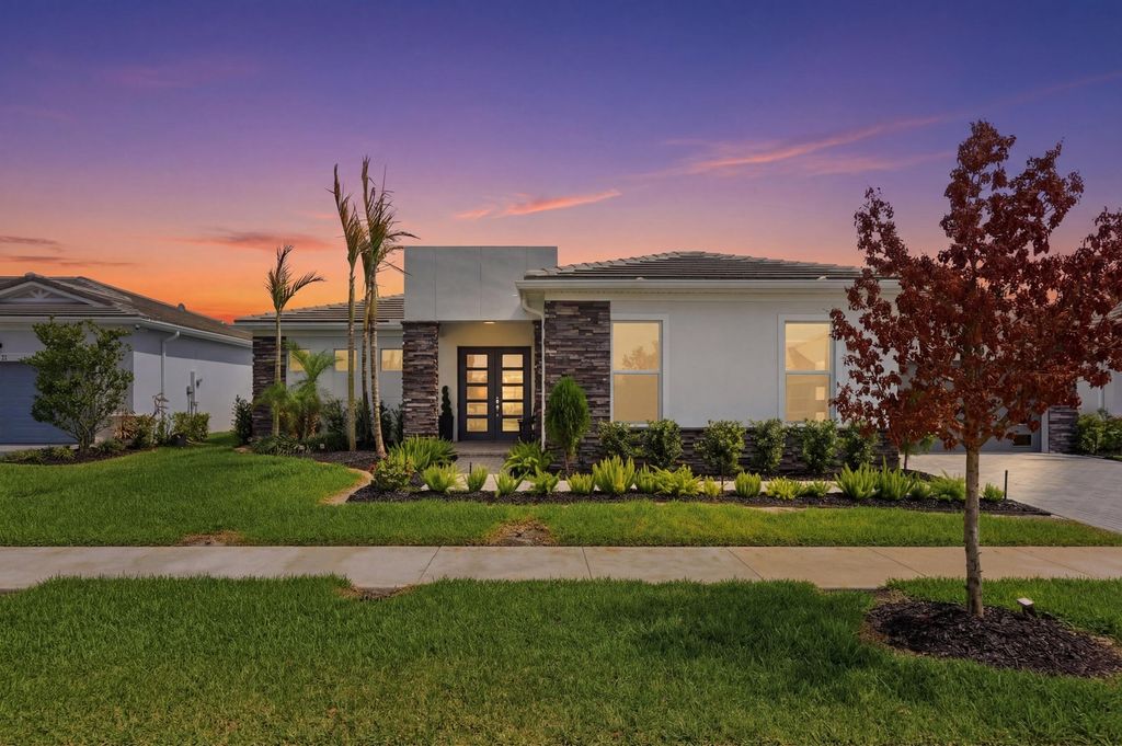 Photo of 10639 Vineyard Drive, Port Saint Lucie, FL 34987 (MLS # B26000514)