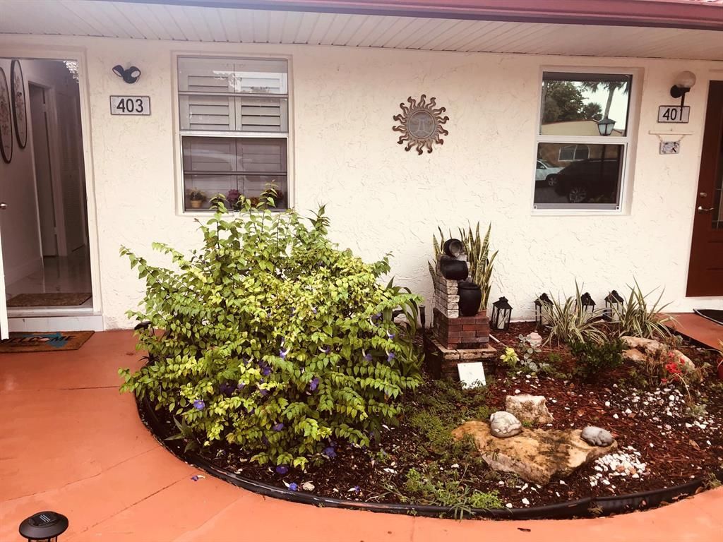 Photo of 403 Lake Evelyn Dr Drive, West Palm Beach, FL 33411 (MLS # R10726969)