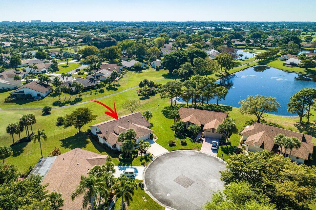 Spacious country club home with a picturesque back yard. This 2 bedroom, 2 bath home has a large lanai that backs up to the 5th green with a butterfly garden and lake view. It has an open floorplan with vaulted ceilings, updated kitchen, quartz counters, and new appliances. Perfect Delray Beach location - Boca Delray is a 55+ community with great amenities, like; club house, pool, fitness center, golf, pickle ball, and tennis. Schedule a showing today. *HOA approval required. *Seasonal rental negotiable. *Showing by appointment only and must be called into security gate ahead of time.