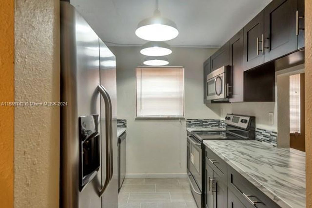 Photo of 1750 N Congress Avenue #310, West Palm Beach, FL 33401 (MLS # R11086037)