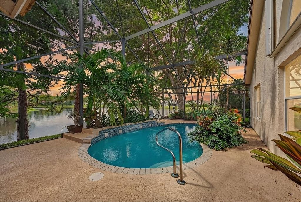 Photo of 2525 Egret Lake Drive, Greenacres, FL 33413 (MLS # B26006169)