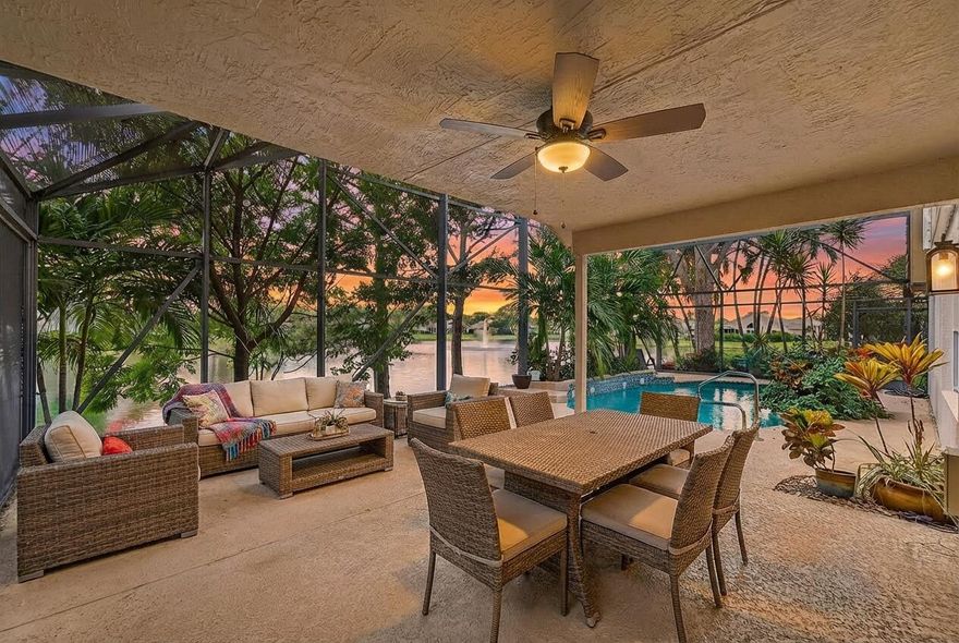 Completely remodeled Lakefront home with a beautiful swimming pool offering a clean, modern feel throughout. The open floor plan features a redesigned kitchen, updated bathrooms, and an expanded laundry room for added functionality.  Enjoy seamless indoor-outdoor living as you walk into stunning lake and sunset views, with a beautifully screened pool area surrounded by natural landscaping. The home is finished with built-in cabinetry and deep storage with pull-outs in both the kitchen and bathrooms.  Located in the gated River Bridge community, residents enjoy resort-style amenities including 6 tennis courts, 2 swimming pools, a fitness center, playground, clubhouse, and walking paths. Some pictures are virtually staged.