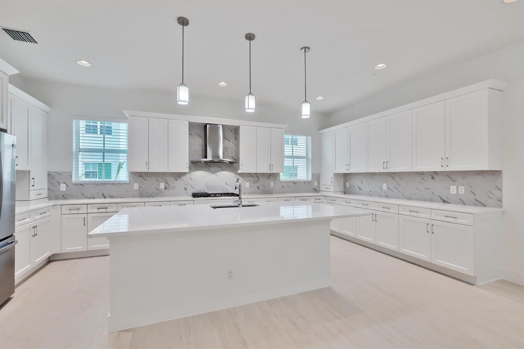 Photo of 5222 Beckman Terrace, Palm Beach Gardens, FL 33418 (MLS # R10923697)