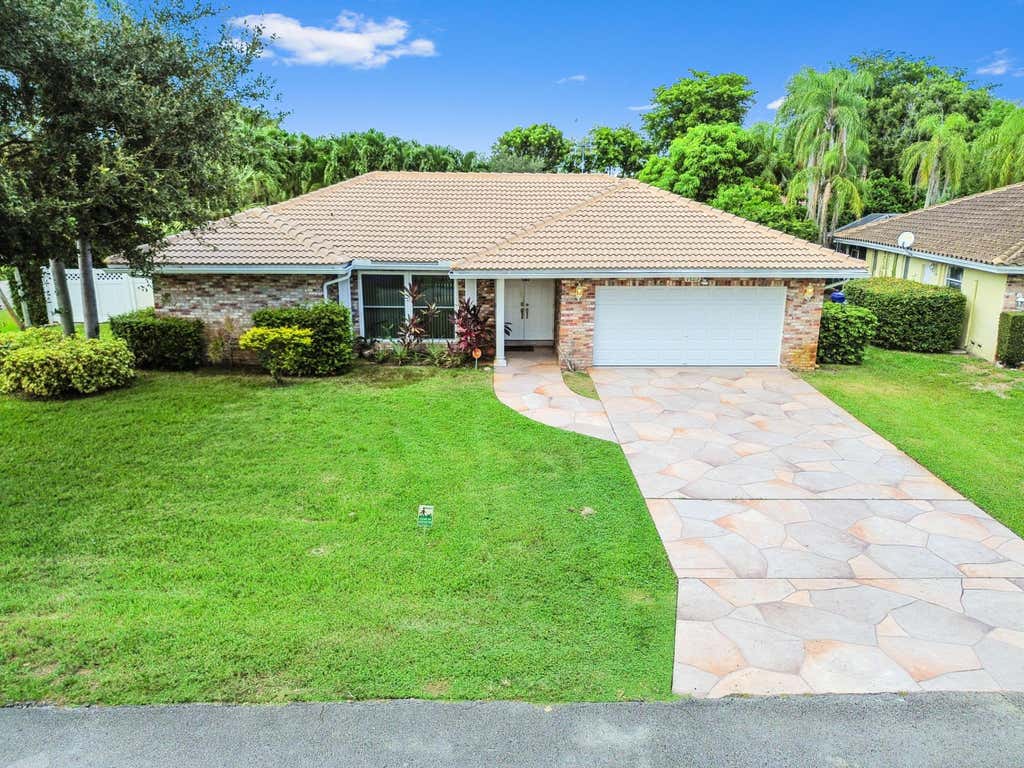 Photo of 7123 NW 42nd Court, Coral Springs, FL 33065 (MLS # B26067022)
