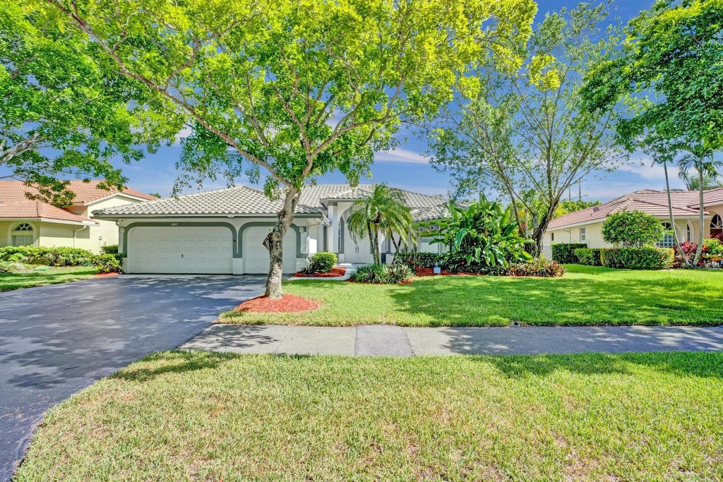 Photo of 4863 Kensington Circle, Coral Springs, FL 33076 (MLS # F10509710)