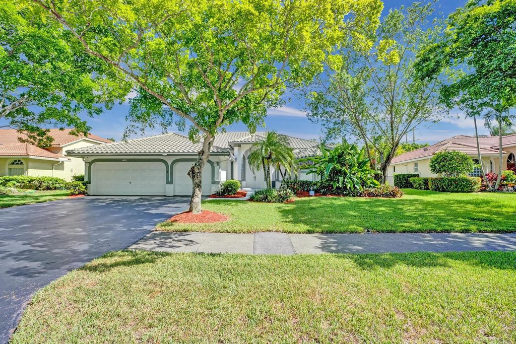 Photo of 4863 Kensington Circle, Coral Springs, FL 33076 (MLS # F10509710)