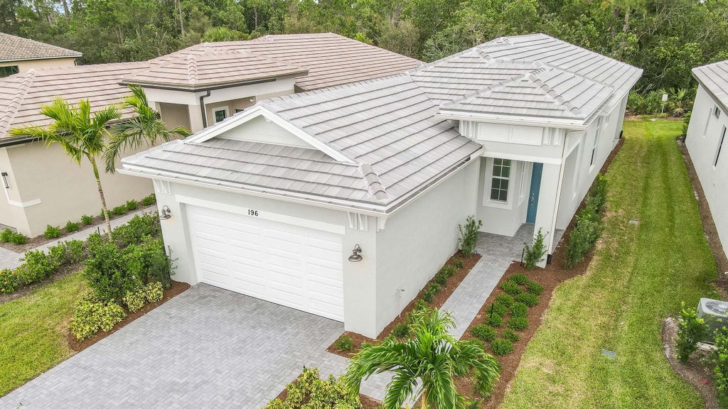 Photo of 196 SE Via Sangro, Port Saint Lucie, FL 34952 (MLS # R11023234)
