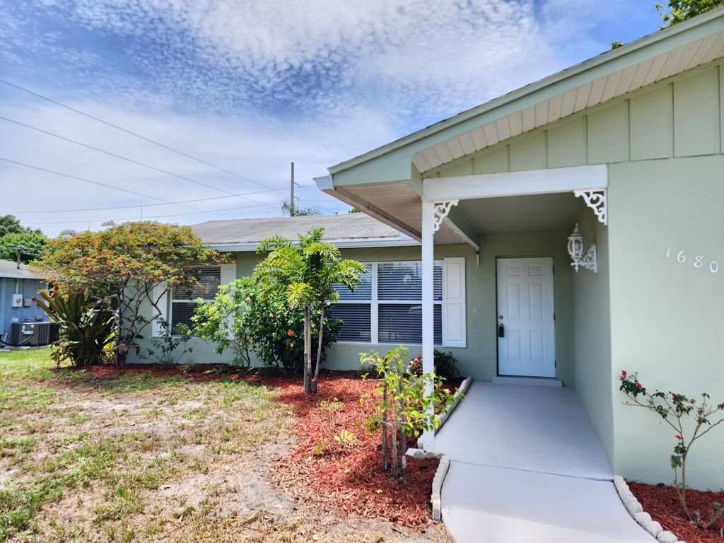 Photo of 1680 SE Minorca Avenue, Port St Lucie, FL 34952 (MLS # R11111306)
