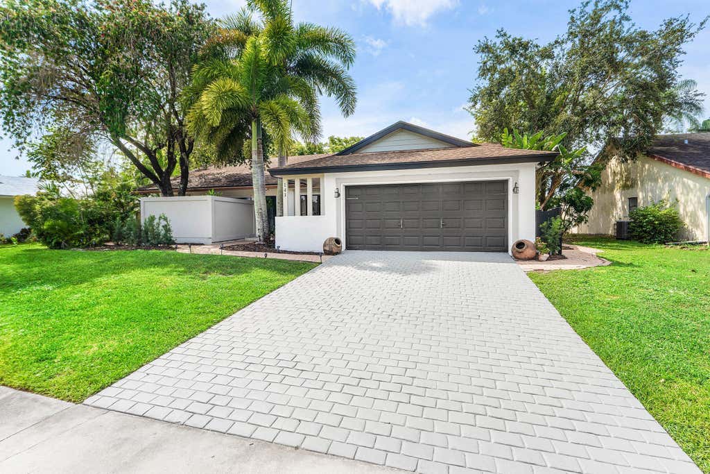 Photo of 143 Miramar Avenue, Royal Palm Beach, FL 33411 (MLS # B26057913)