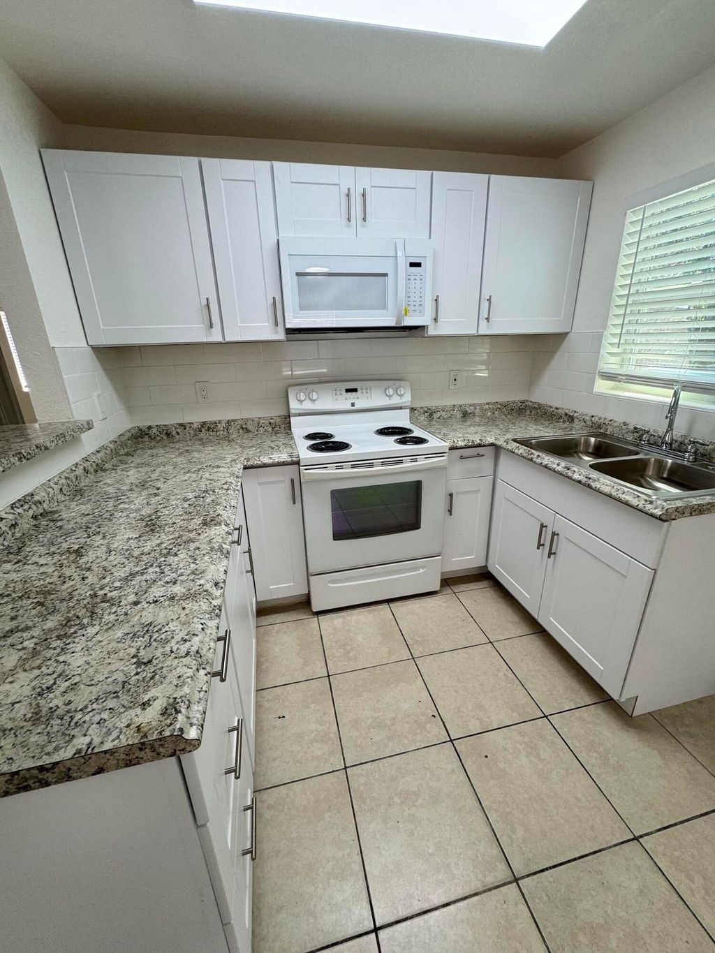 Photo of 814 39th Street, West Palm Beach, FL 33407 (MLS # B26006126)