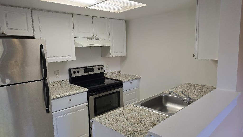 Photo of 3242 CORAL LAKE Lane #3242, Coral Springs, FL 33065 (MLS # B26063541)