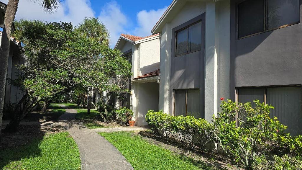 Photo of 3242 CORAL LAKE Lane #3242, Coral Springs, FL 33065 (MLS # B26063541)