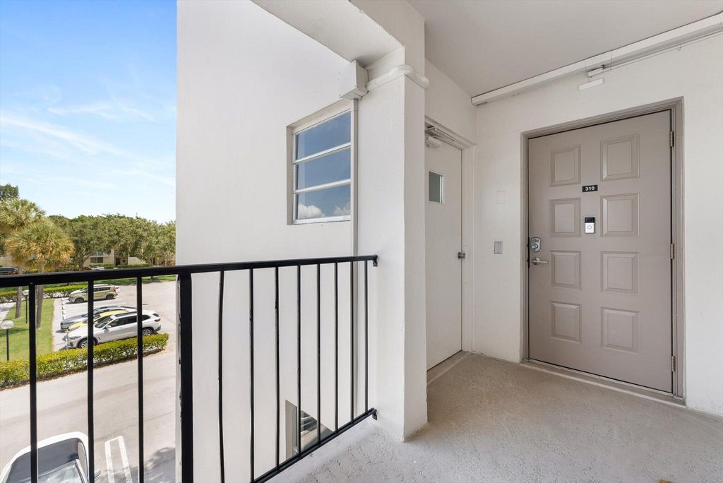 Photo of 3200 N Palm Aire Drive #310, Pompano Beach, FL 33069 (MLS # B26044450)