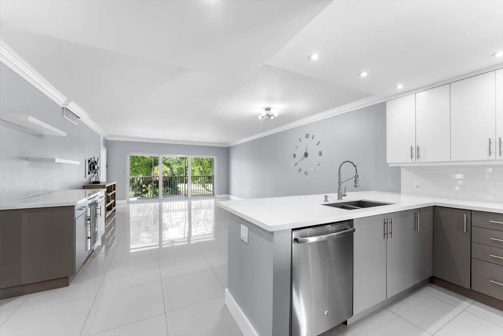 Photo of 3200 N Palm Aire Drive #310, Pompano Beach, FL 33069 (MLS # B26044450)