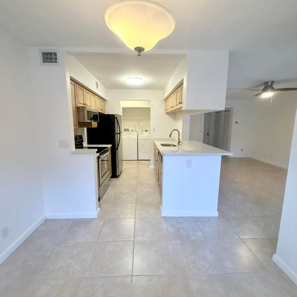 Photo of 9955 Westview Drive #218, Coral Springs, FL 33076 (MLS # B26055245)