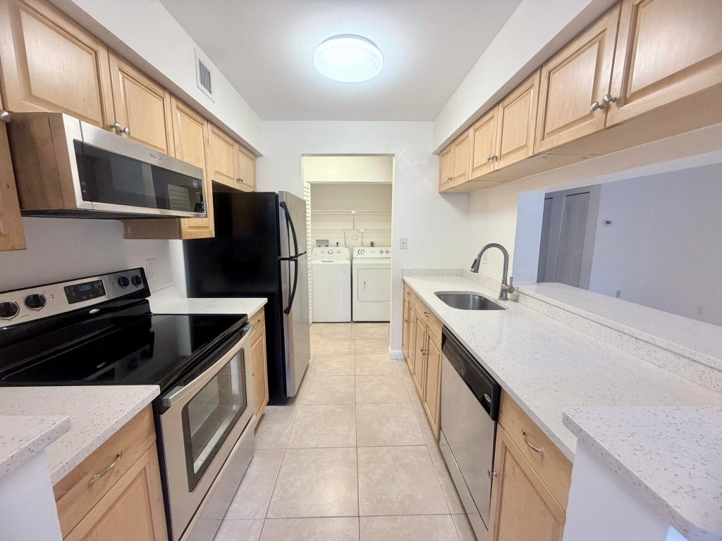 Photo of 9955 Westview Drive #218, Coral Springs, FL 33076 (MLS # B26055245)