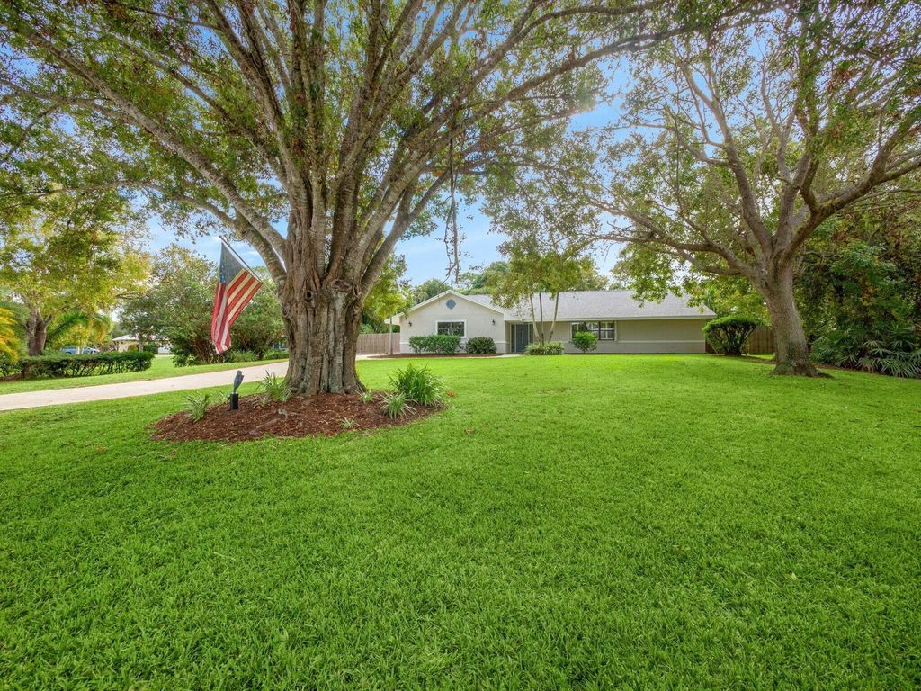 Photo of 1600 SW Belgrave Terrace, Stuart, FL 34997 (MLS # R11039122)
