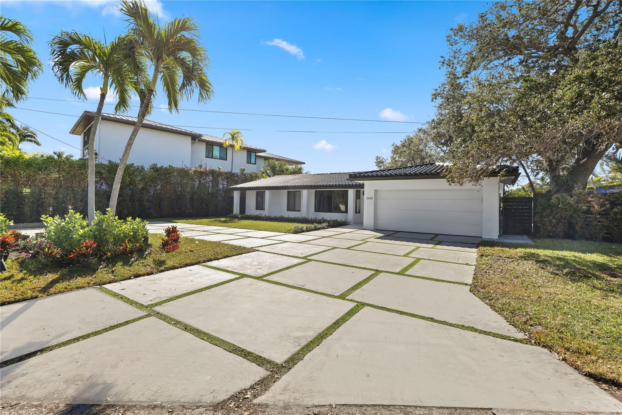 Discover your dream home in Coral Ridge! This beautifully updated home offers 4-bedrooms, 2-bathrooms, a 2-car garage, and impact windows and doors. The open-concept design with high-end finishes and a modern kitchen featuring top appliances and a spacious island is great for large families and entertaining. The oversized backyard includes a sparkling pool, large dock, and serene Middle River Waterway views. Boating enthusiasts will appreciate ocean access with one fixed bridge allowing 40 ft boats with ease. Located in the A-rated Bayview Elementary school district, enjoy easy access to the beach, shopping, and amenities. Option to purchase furnished or unfurnished. Owner is willing to help with buy down rate and closing cost